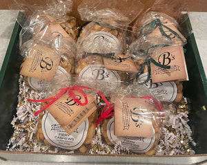 "A Holiday Gift 8-Pack (2 of Each Flavor) + a free bag of our Festive Cashews